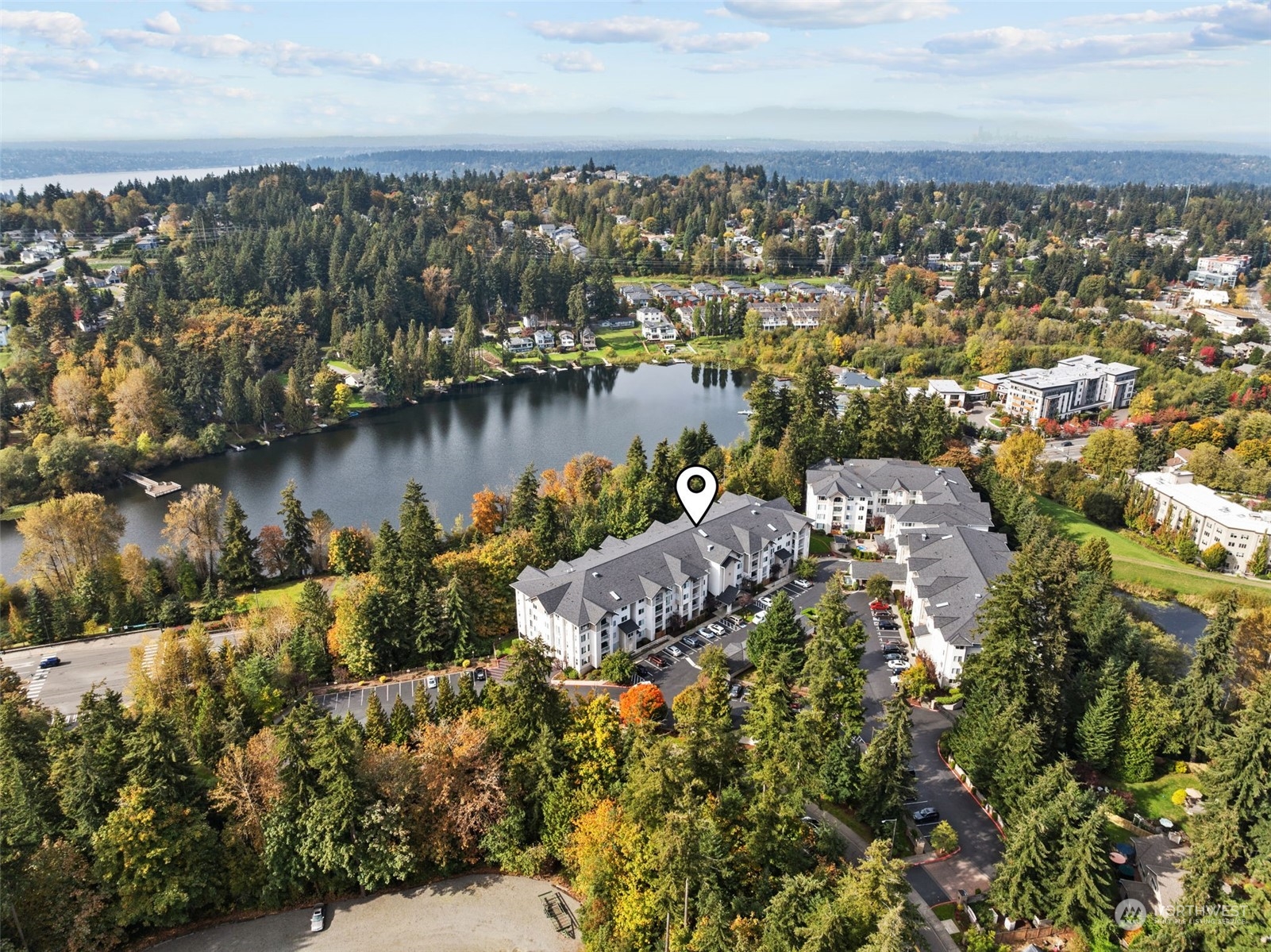 an aerial view of multiple house with outdoor space