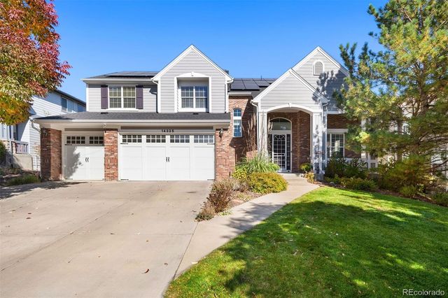 $1,175,000 | 14325 West Dartmouth Drive | Green Mountain