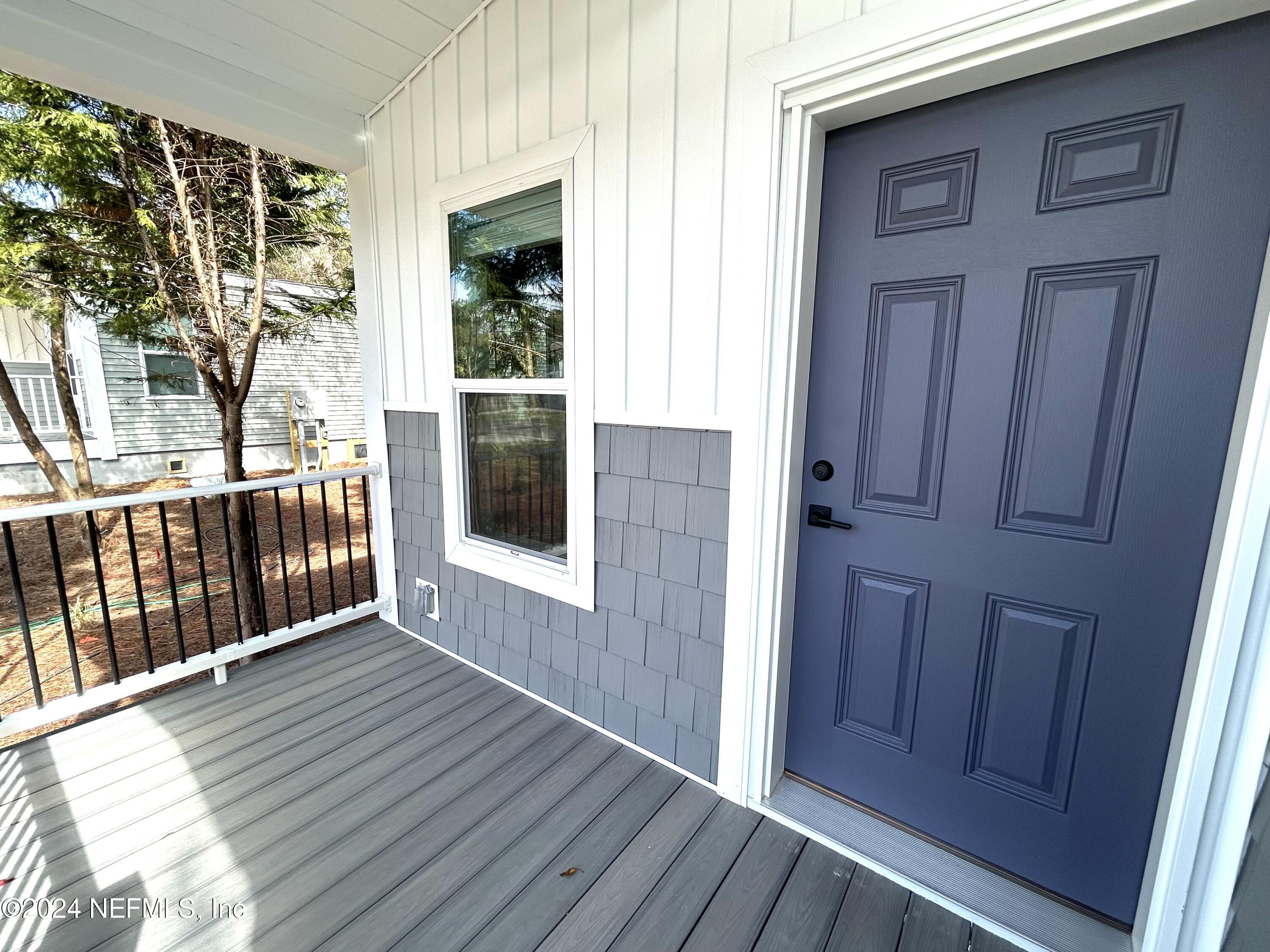 a view of a house with a porch