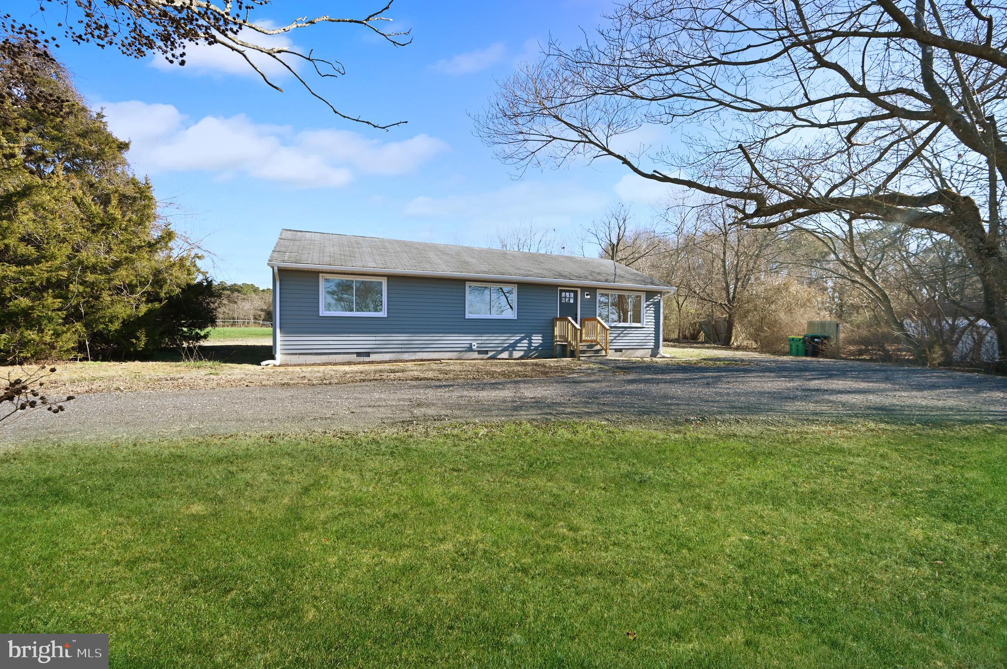 a front view of house with yard