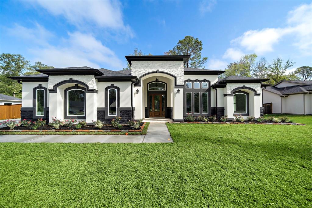 front view of a house with a yard