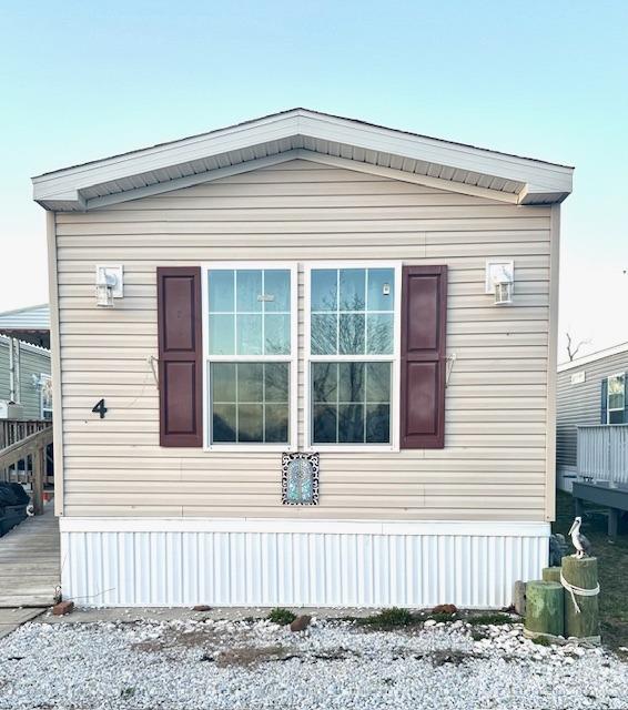 a front view of a house with a porch