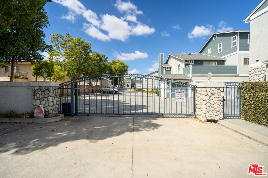 a view of a brick house with a street view