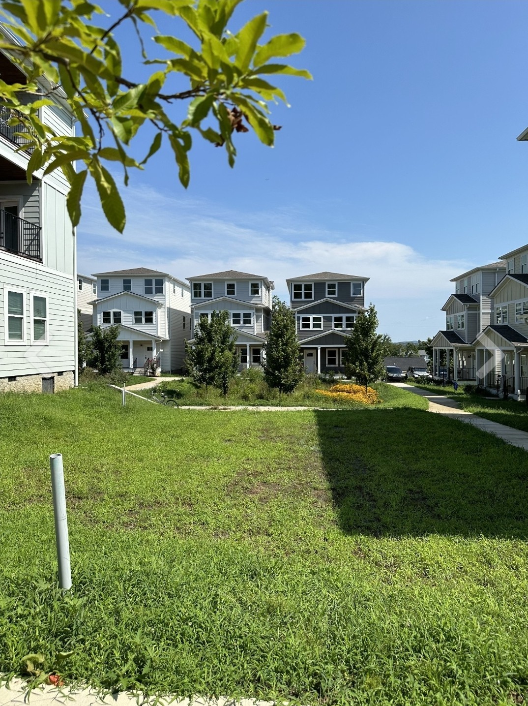 a view of a house with a backyard