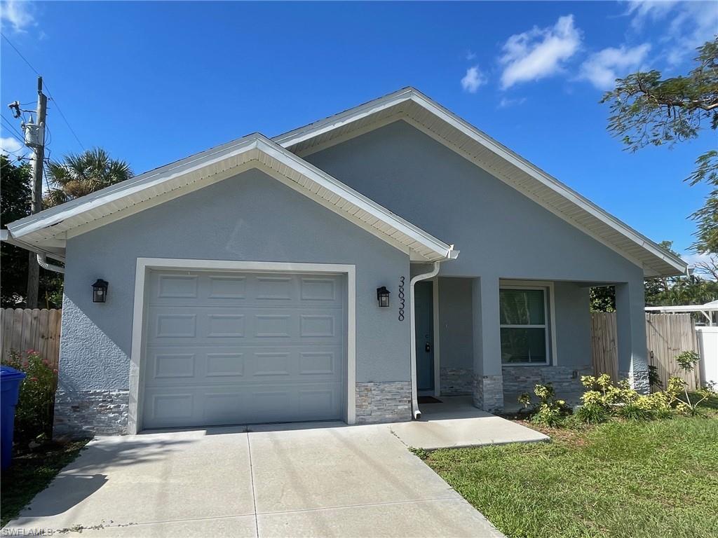 Ranch-style house with a garage