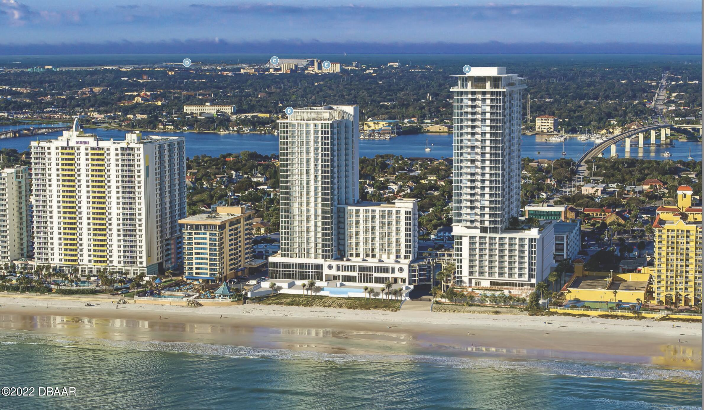 a view of city with ocean