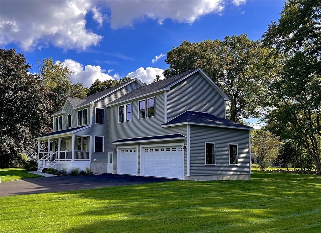 a view of a house with a big yard