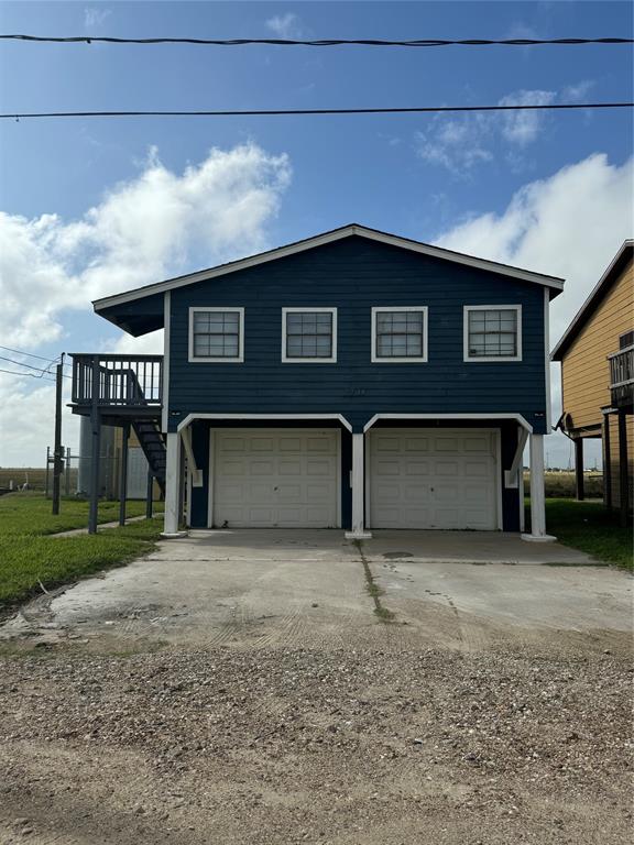 a front view of a house with yard