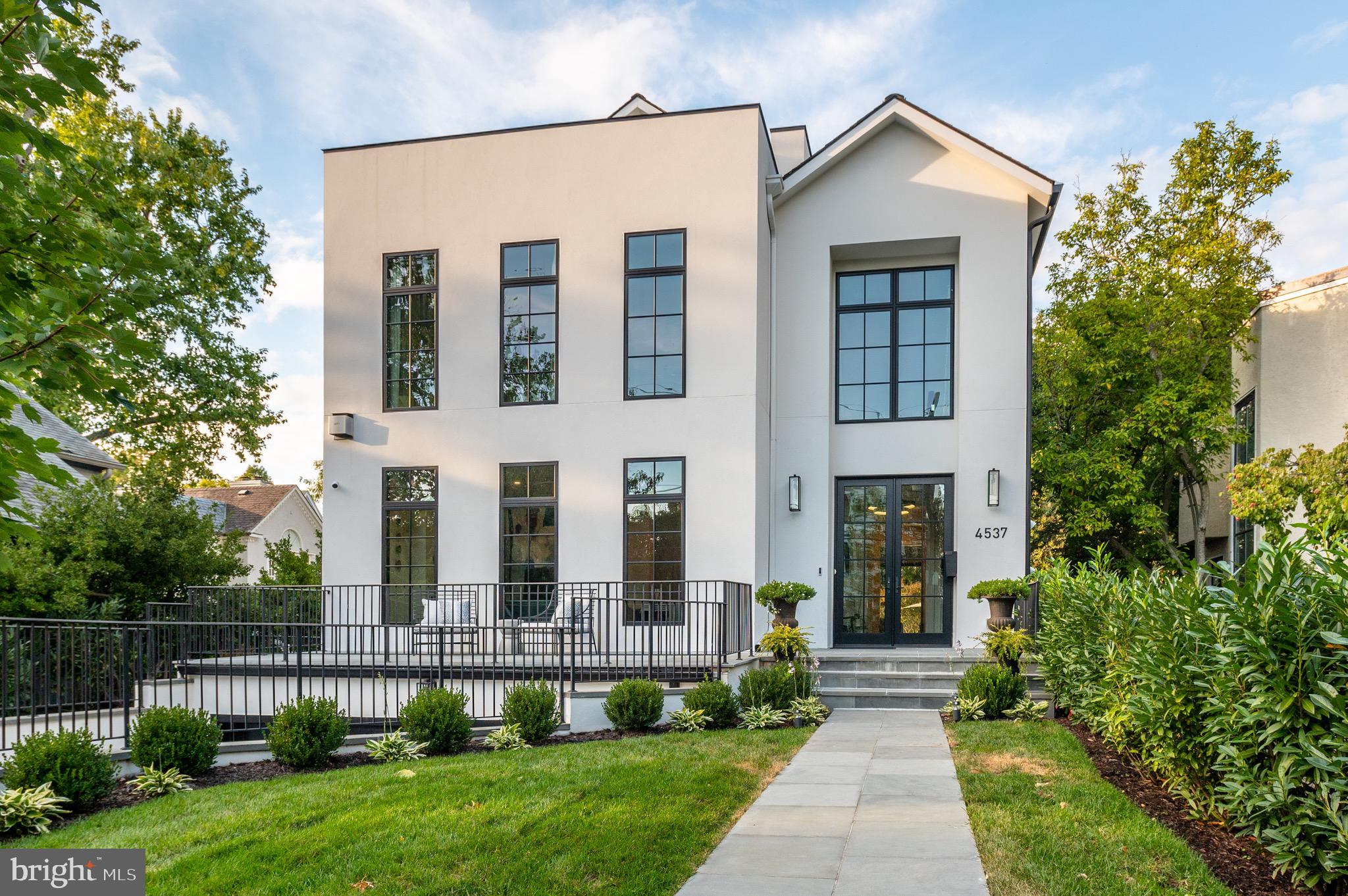 Dramatic Contemporary Facade with Spacious Terrace