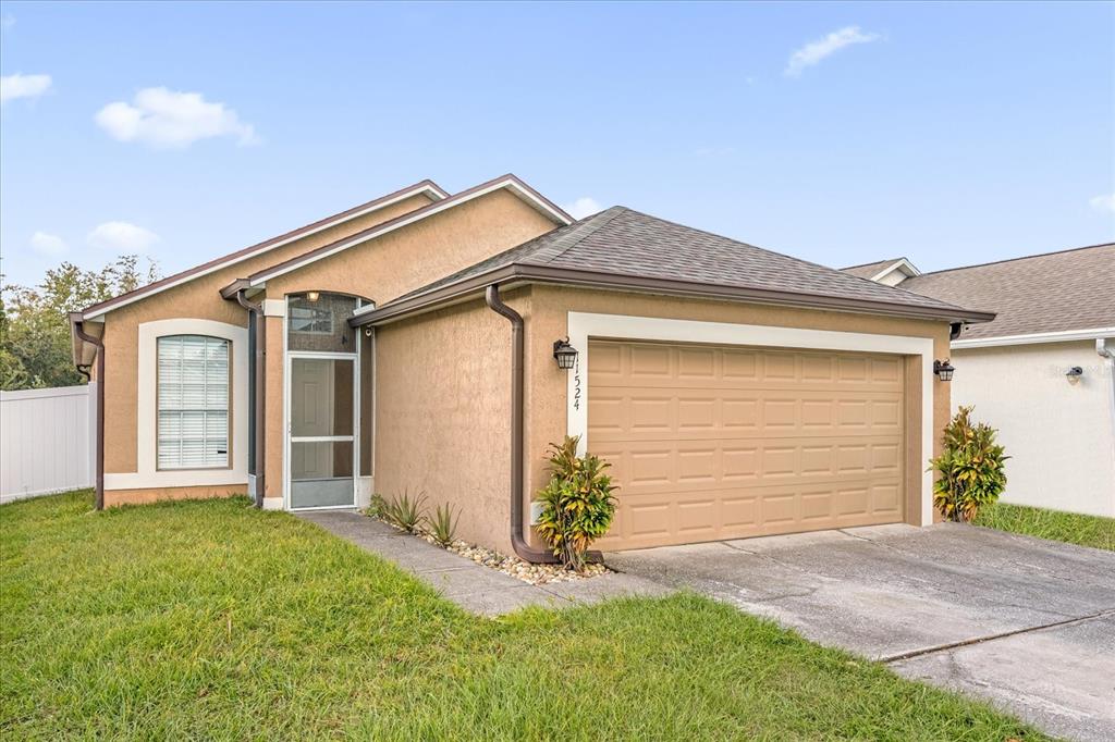 front view of house with a yard