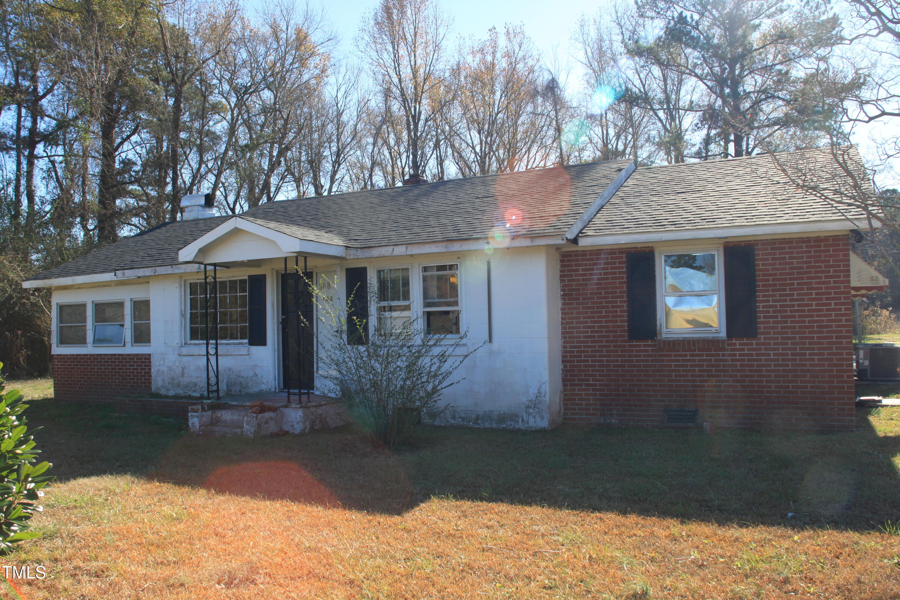 a front view of a house with yard