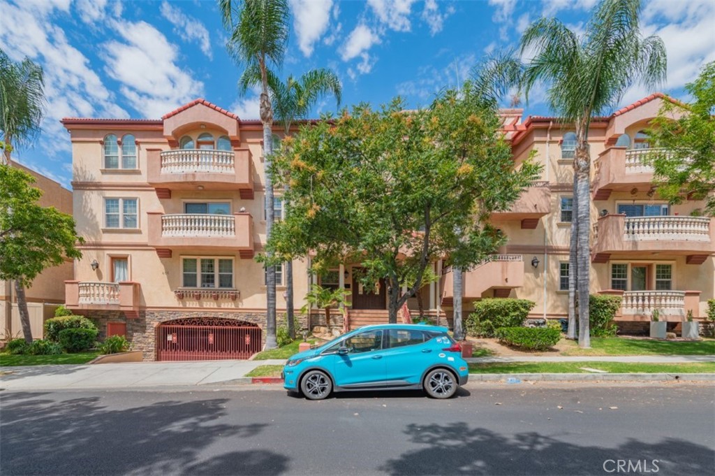 a car parked in front of a house