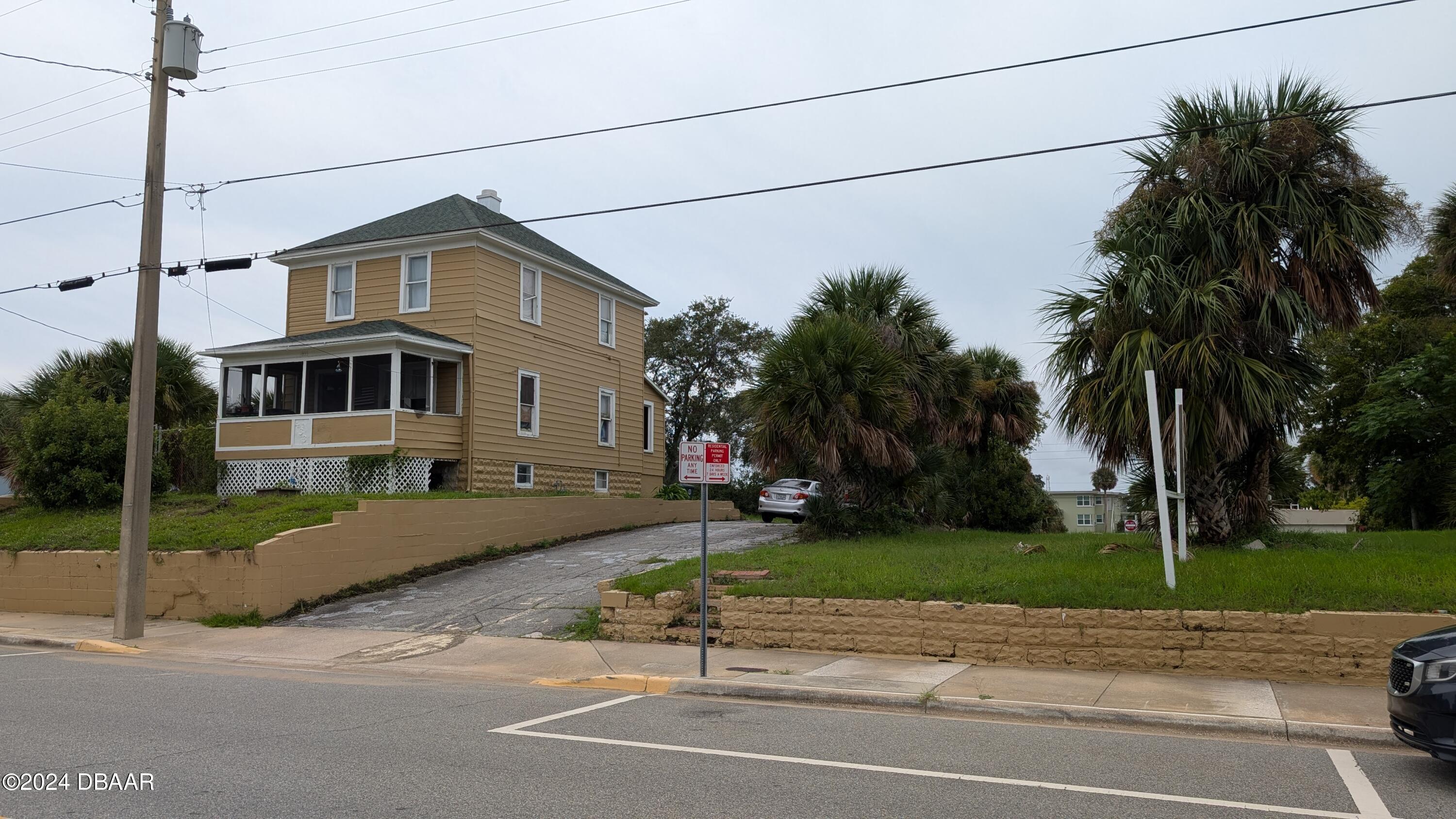 a view of a street with a house