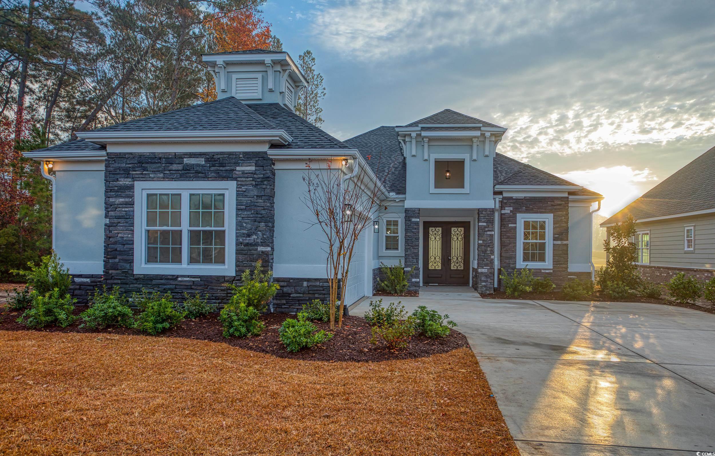 View of front of house with french doors