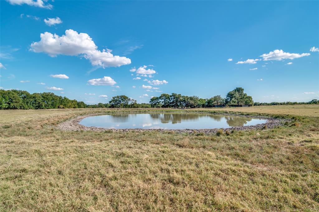 a view of a lake with outdoor space