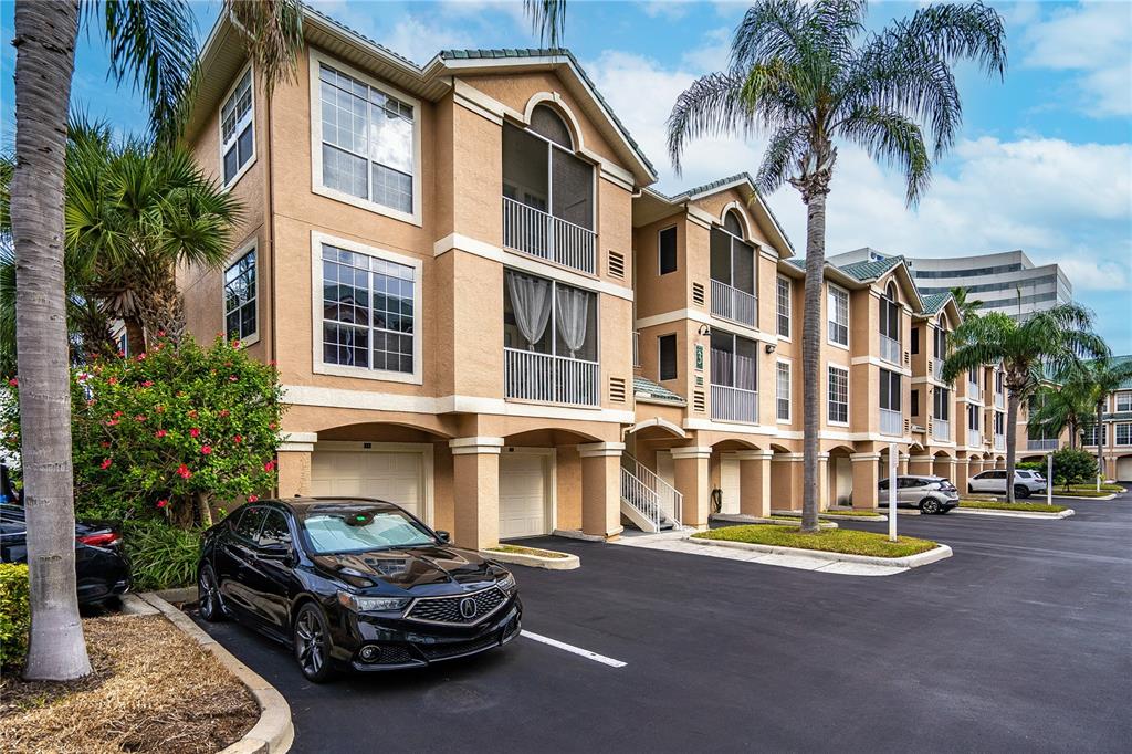 a front view of a building with parking space