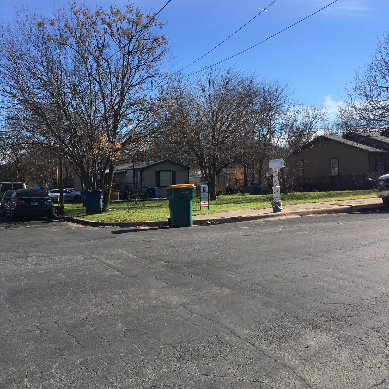 a view of street with houses