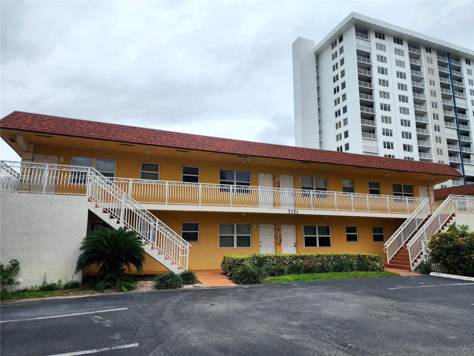 front view of a building with a street