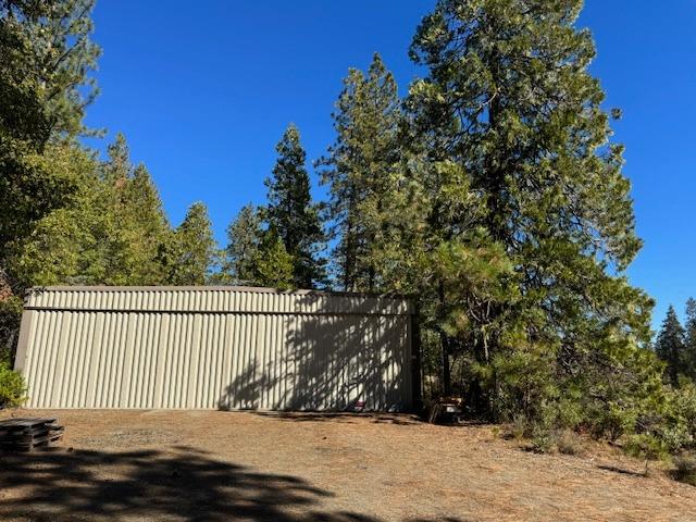 a view of outdoor space with wooden fence