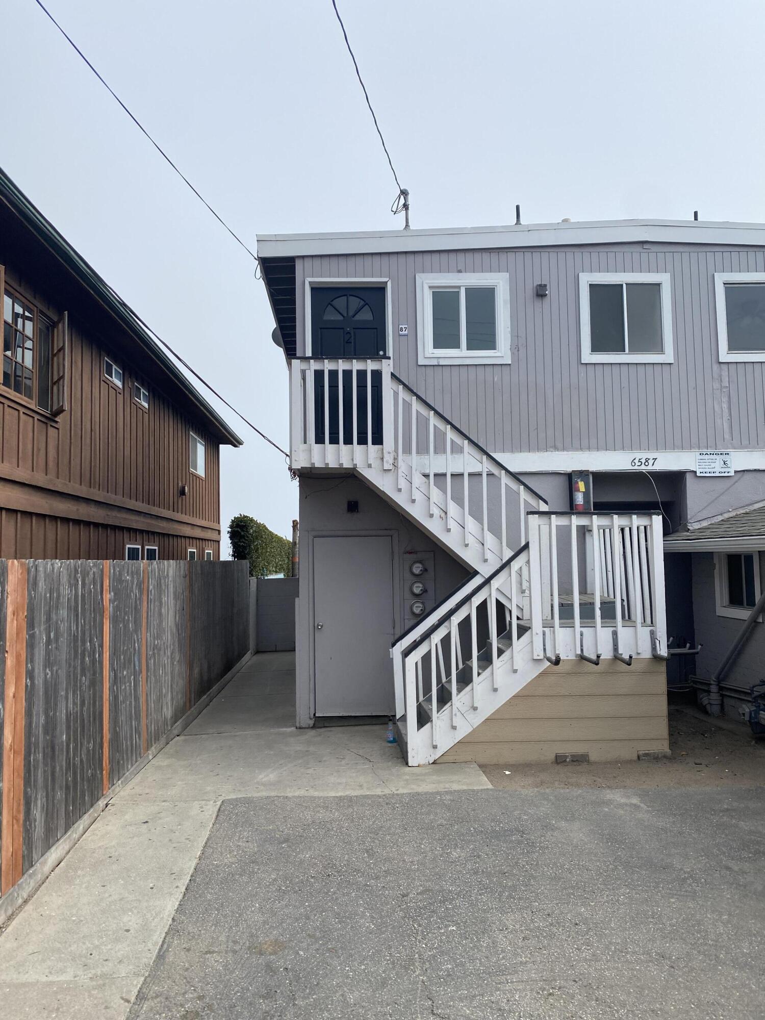 a view of front door and deck