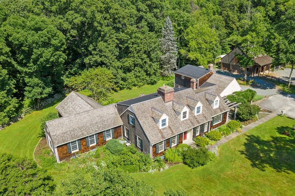 an aerial view of a house with a garden