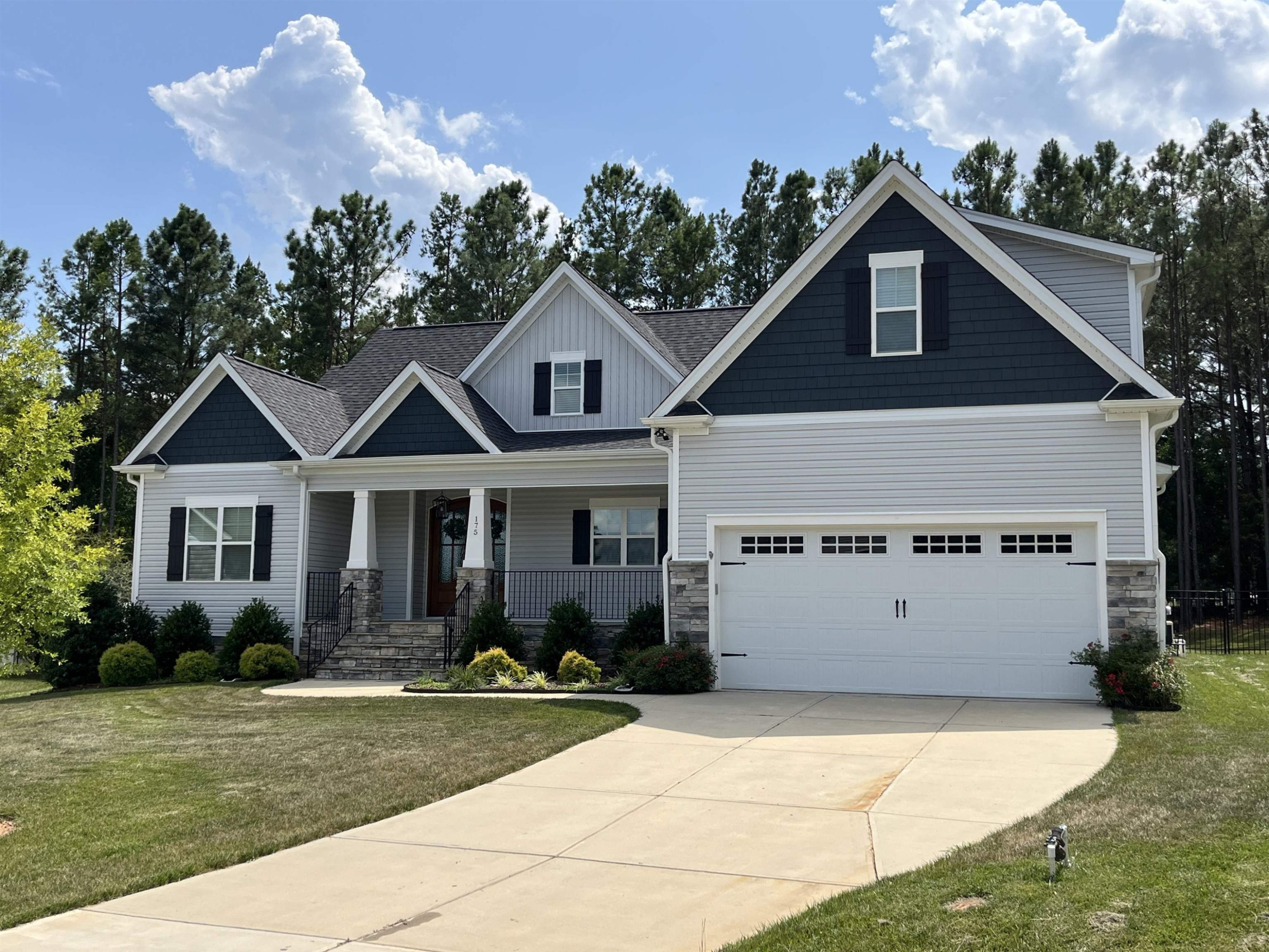 a view of house with yard entertaining space