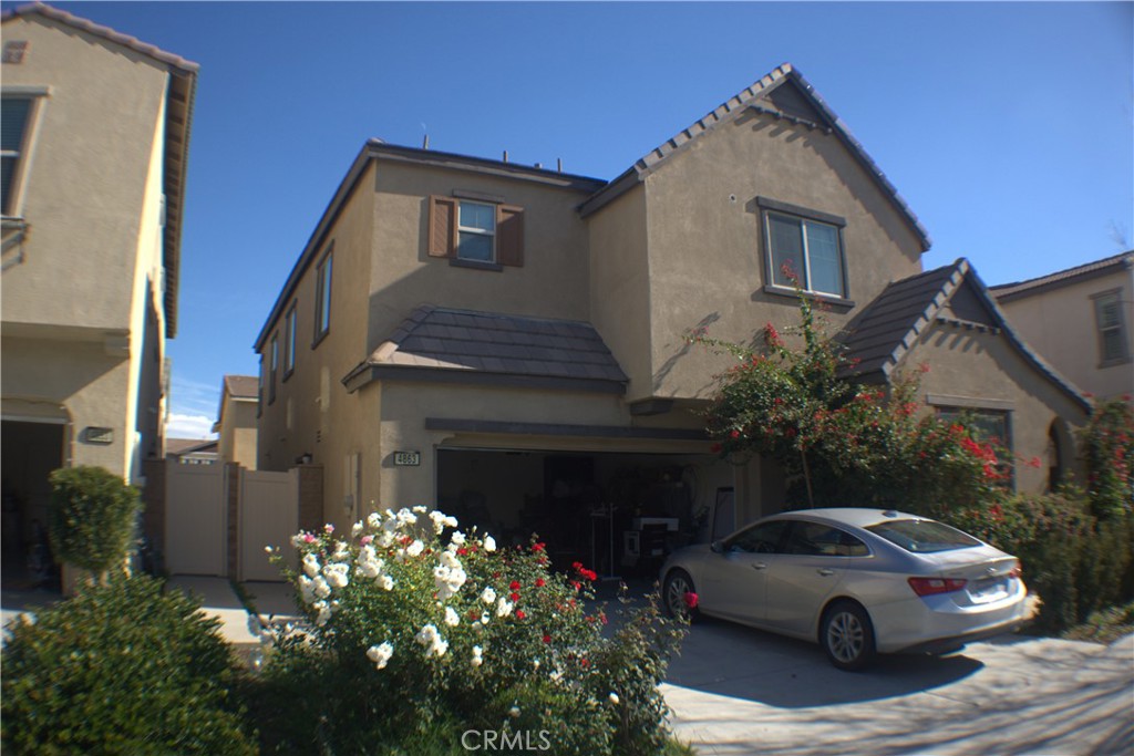 a car parked in front of a house