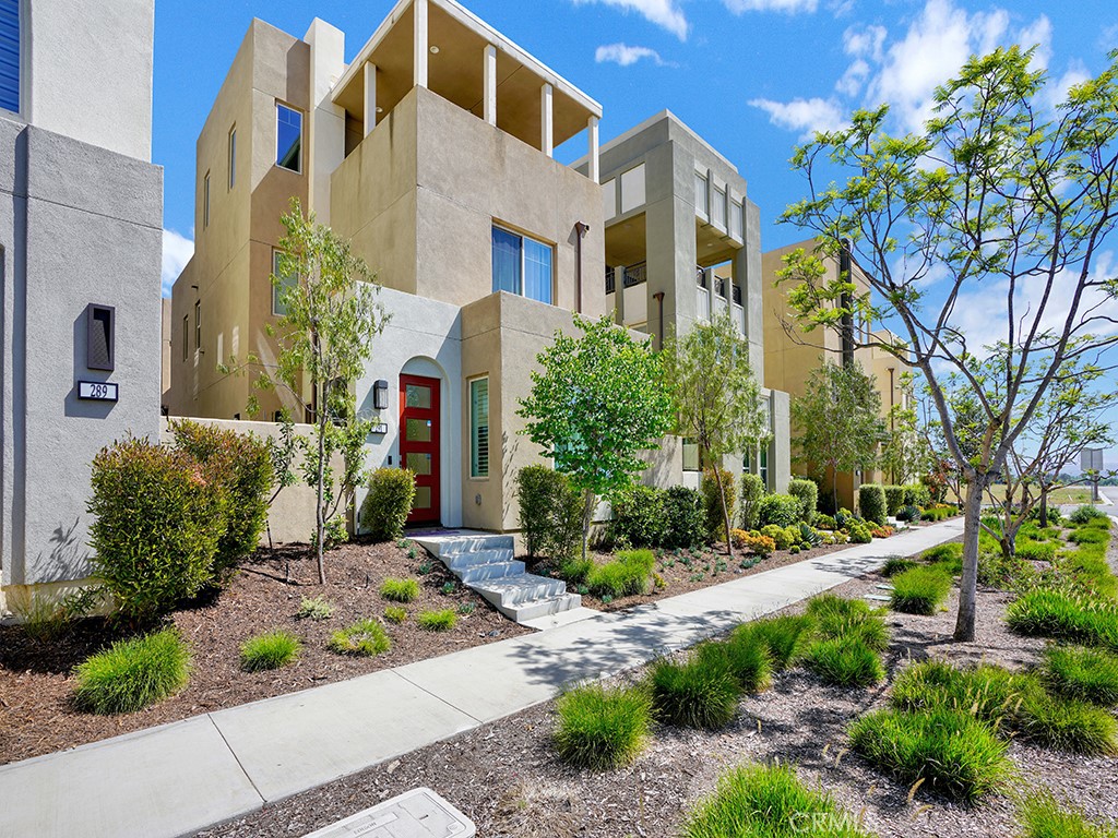 a front view of a multi story residential apartment buildings