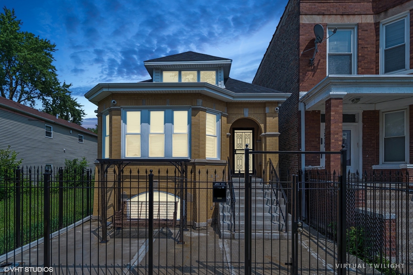 a front view of a house with a yard