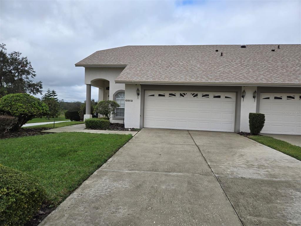 a front view of house with yard