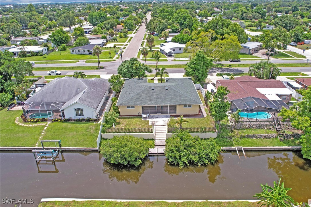 an aerial view of a house with a garden