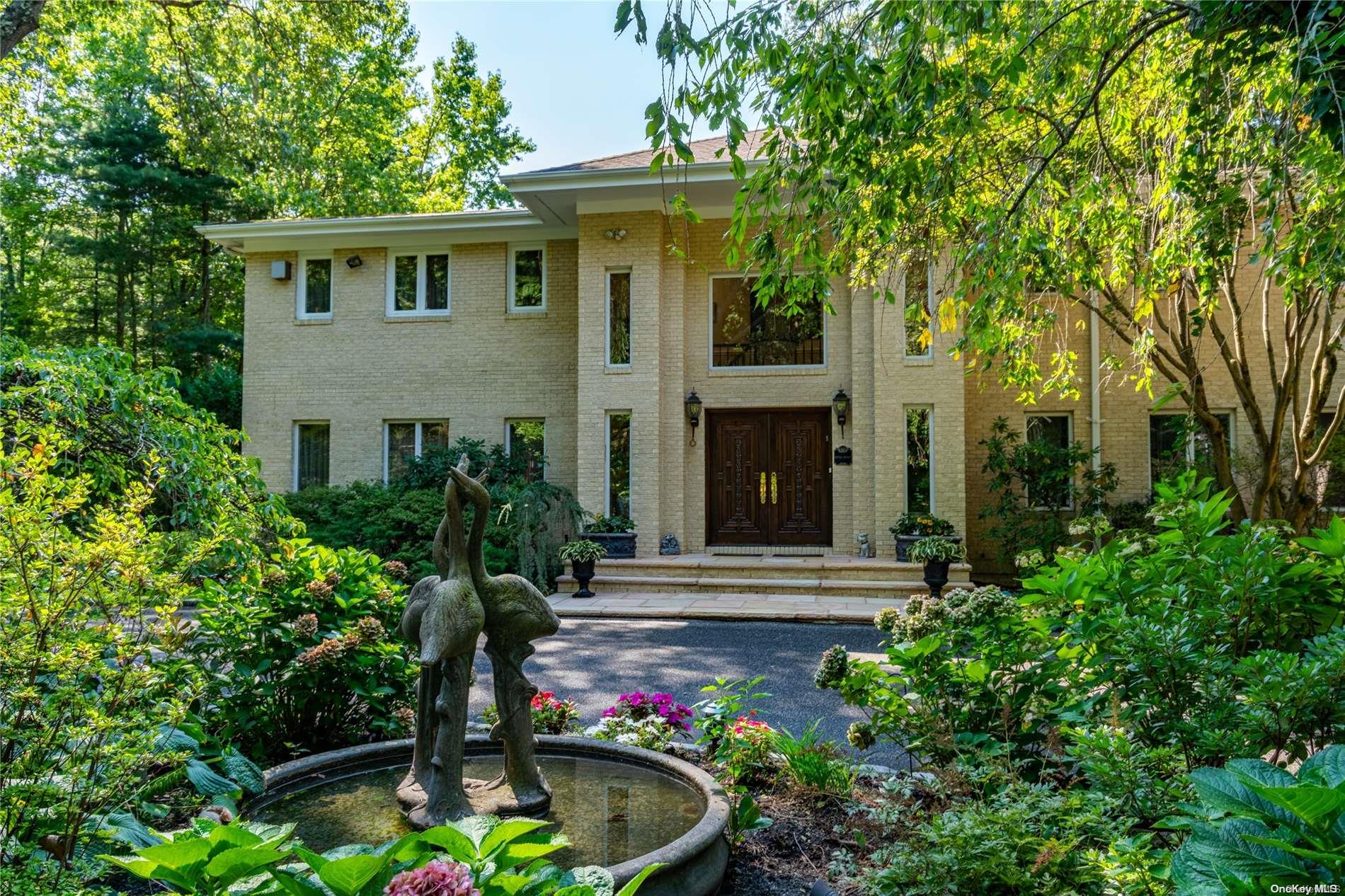 front view of house with a yard