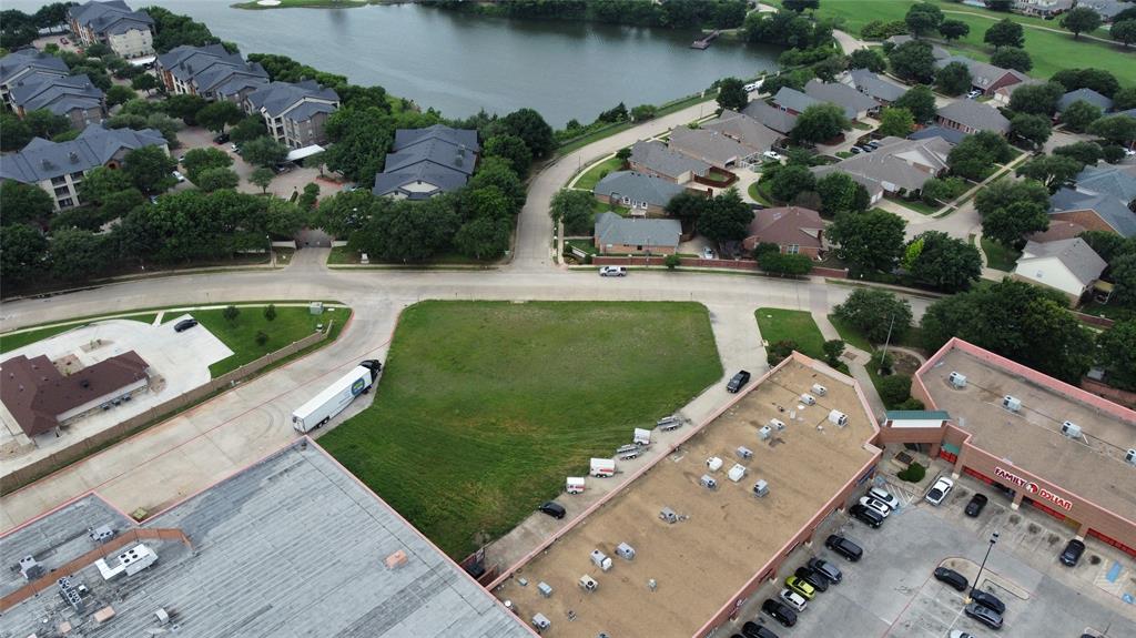 an aerial view of a house with outdoor space swimming pool