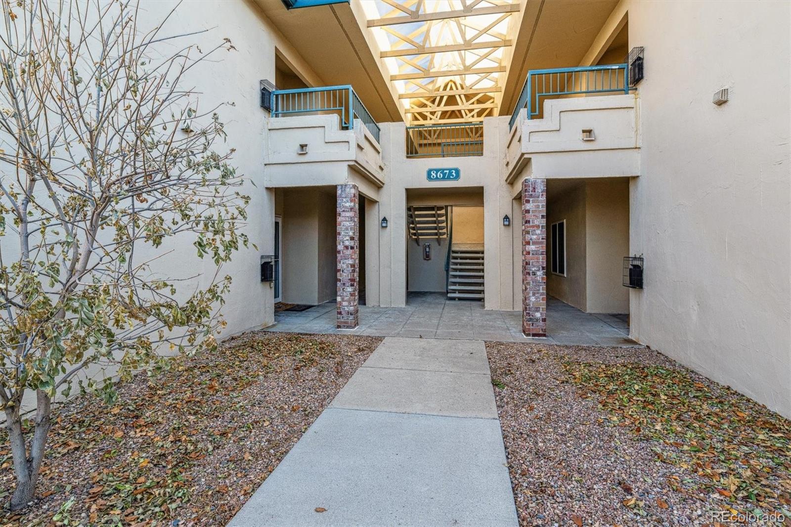 a view of a hallway with a building