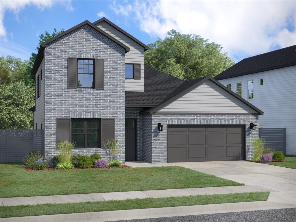 a front view of a house with a garage and garage