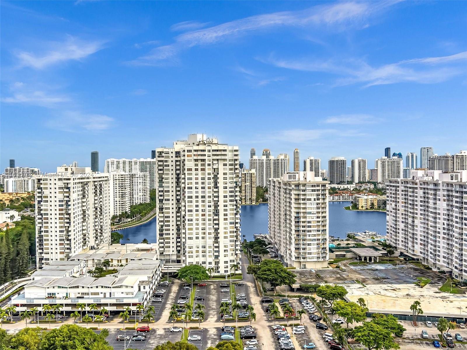 a view of a city with tall buildings