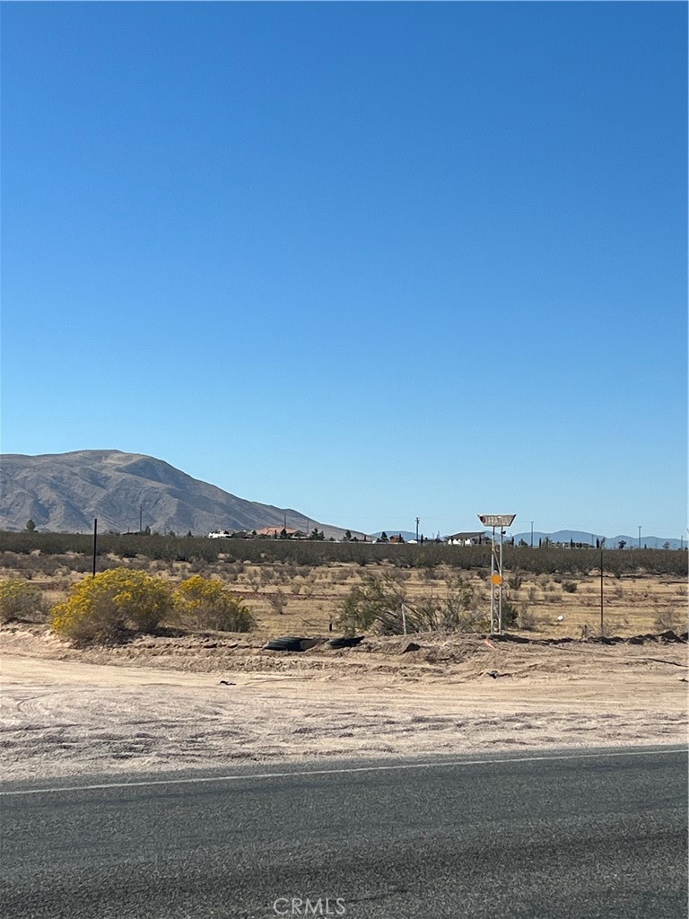 a view of ocean and mountain