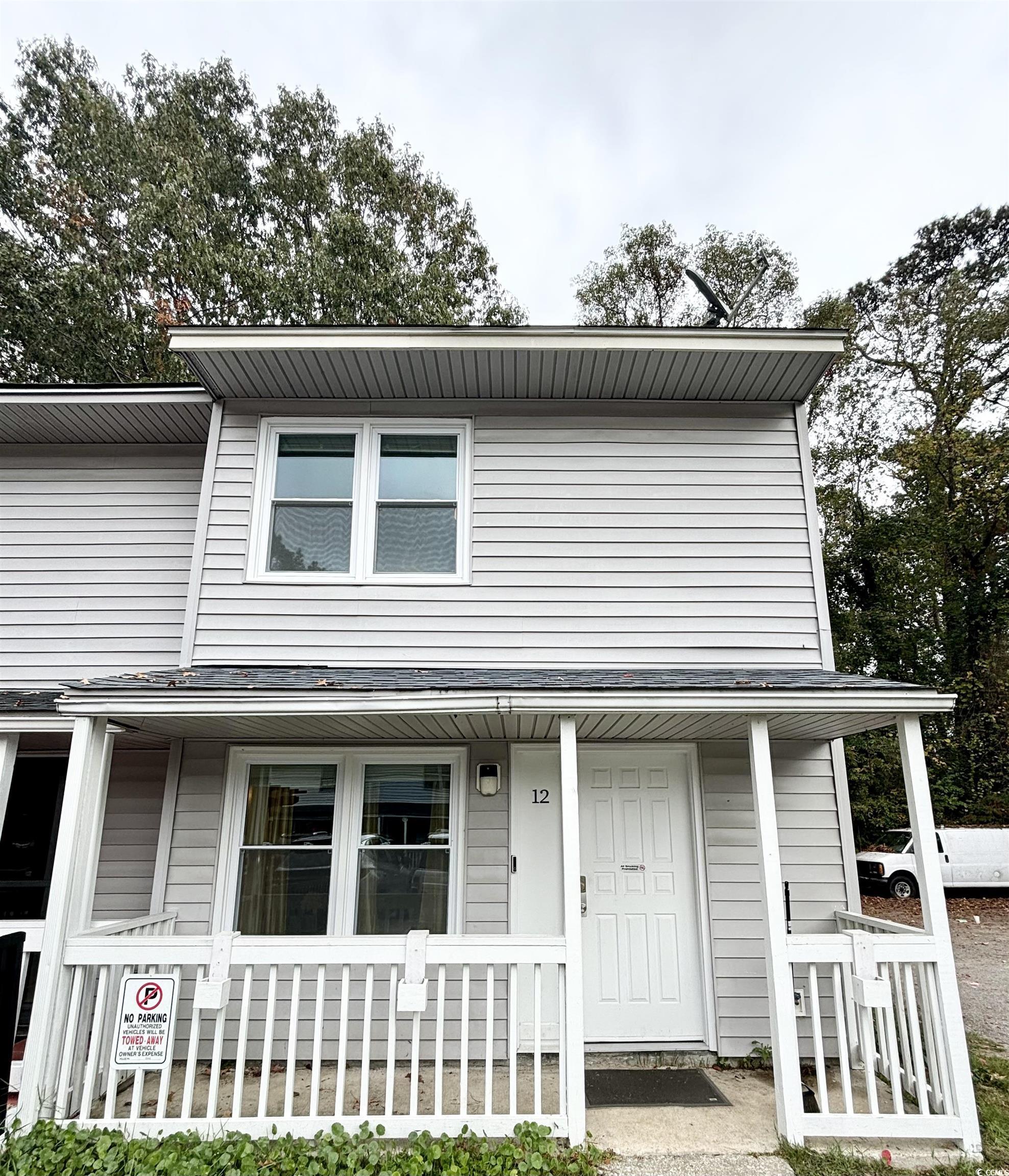 View of front of property with covered porch