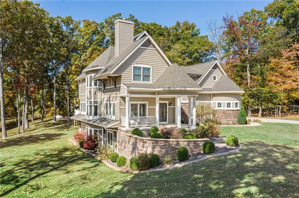 front view of house with a yard