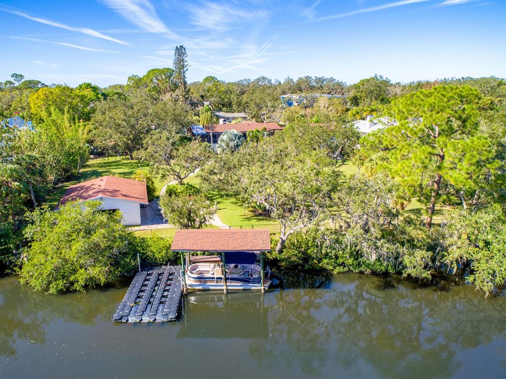 Beautiful waterfront lot with 103 ft on Phillippi Creek.