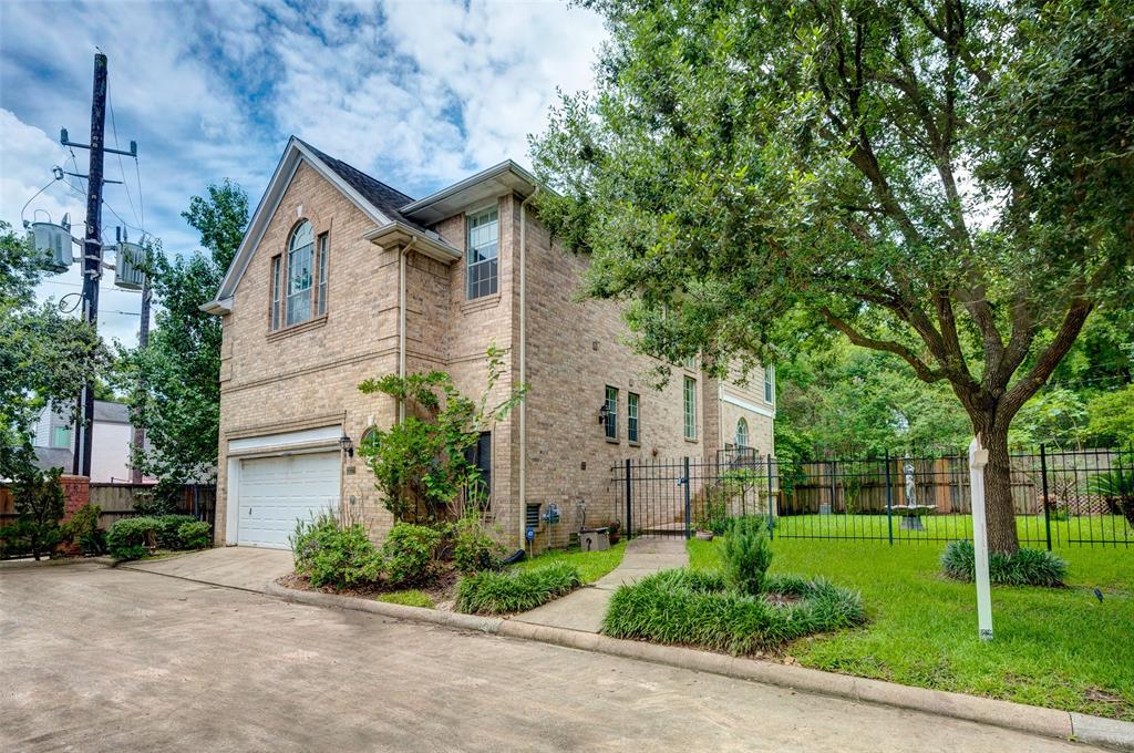 This 3 bedroom home sits on a private double lot and has a fully fenced side yard with a fountain, palm trees and tropical landscaping.