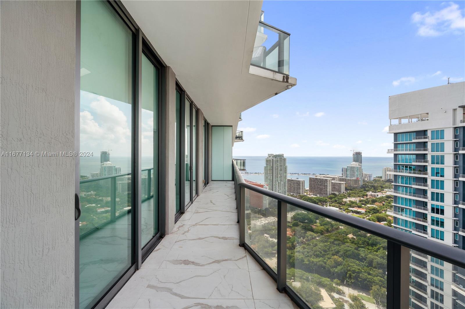 a view of a balcony with city view