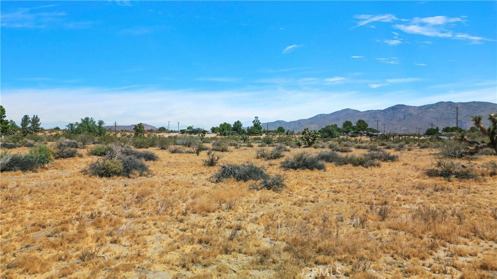 a view of an outdoor space with mountain view