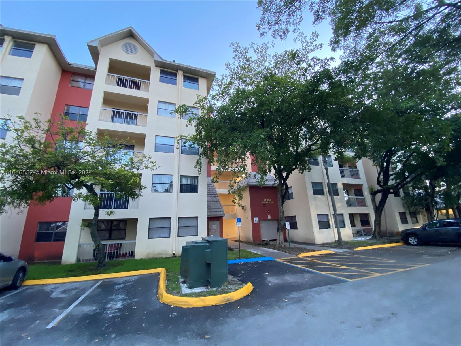 a front view of residential houses with yard