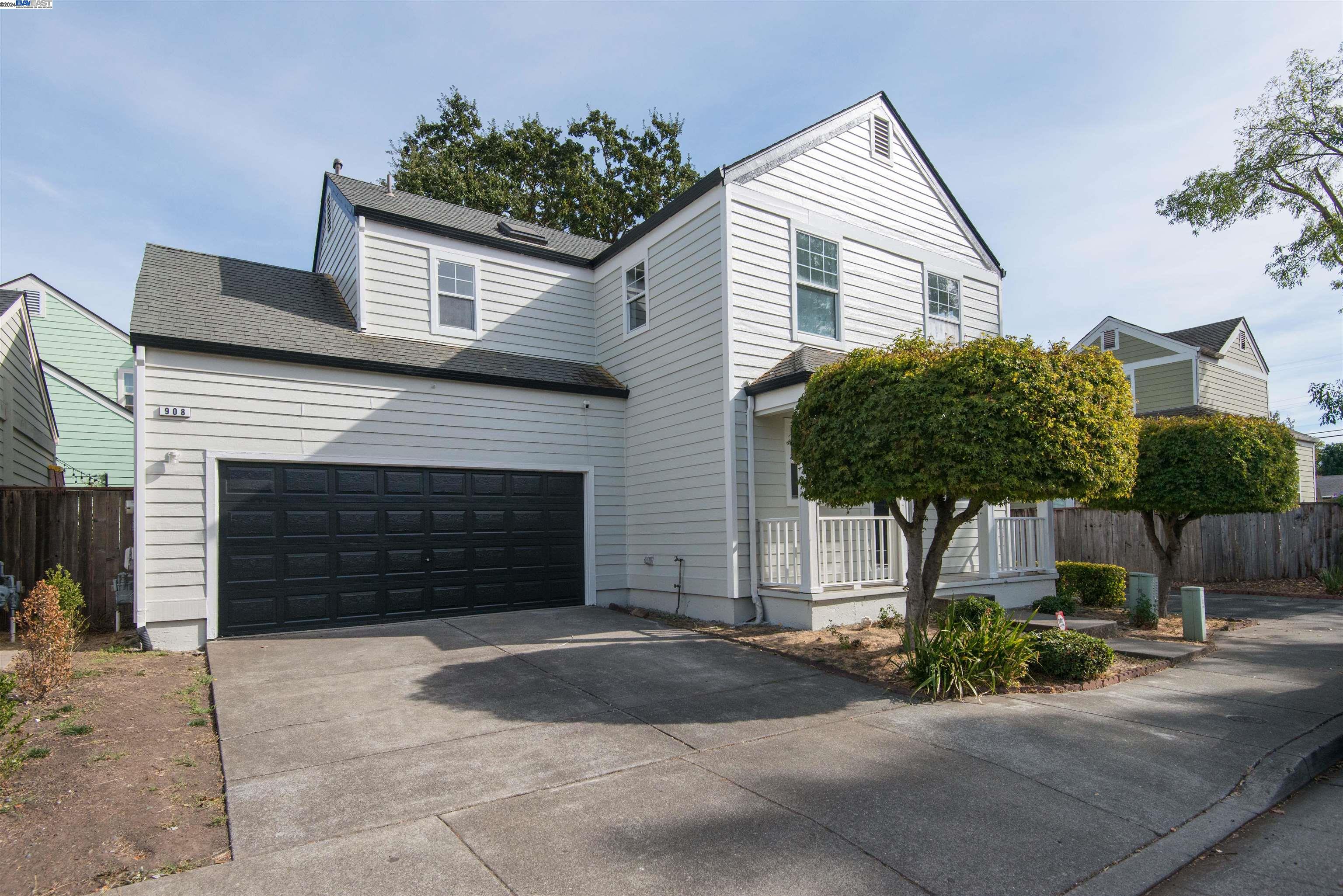 a front view of a house with garage