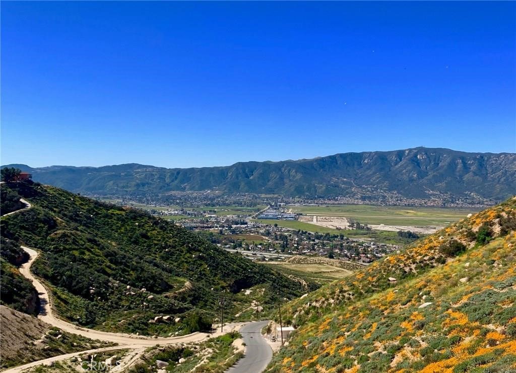 a view of a water with mountain