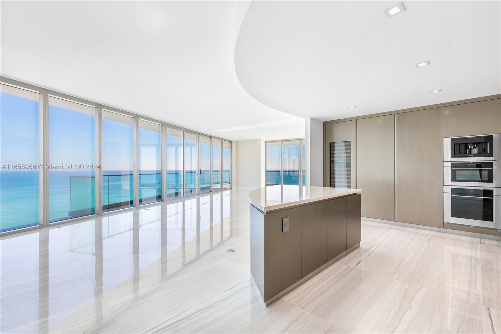 a view of a large window with wooden floor