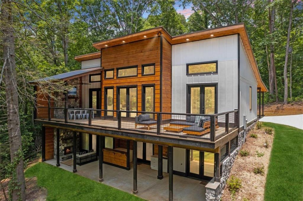 a balcony view with a seating space