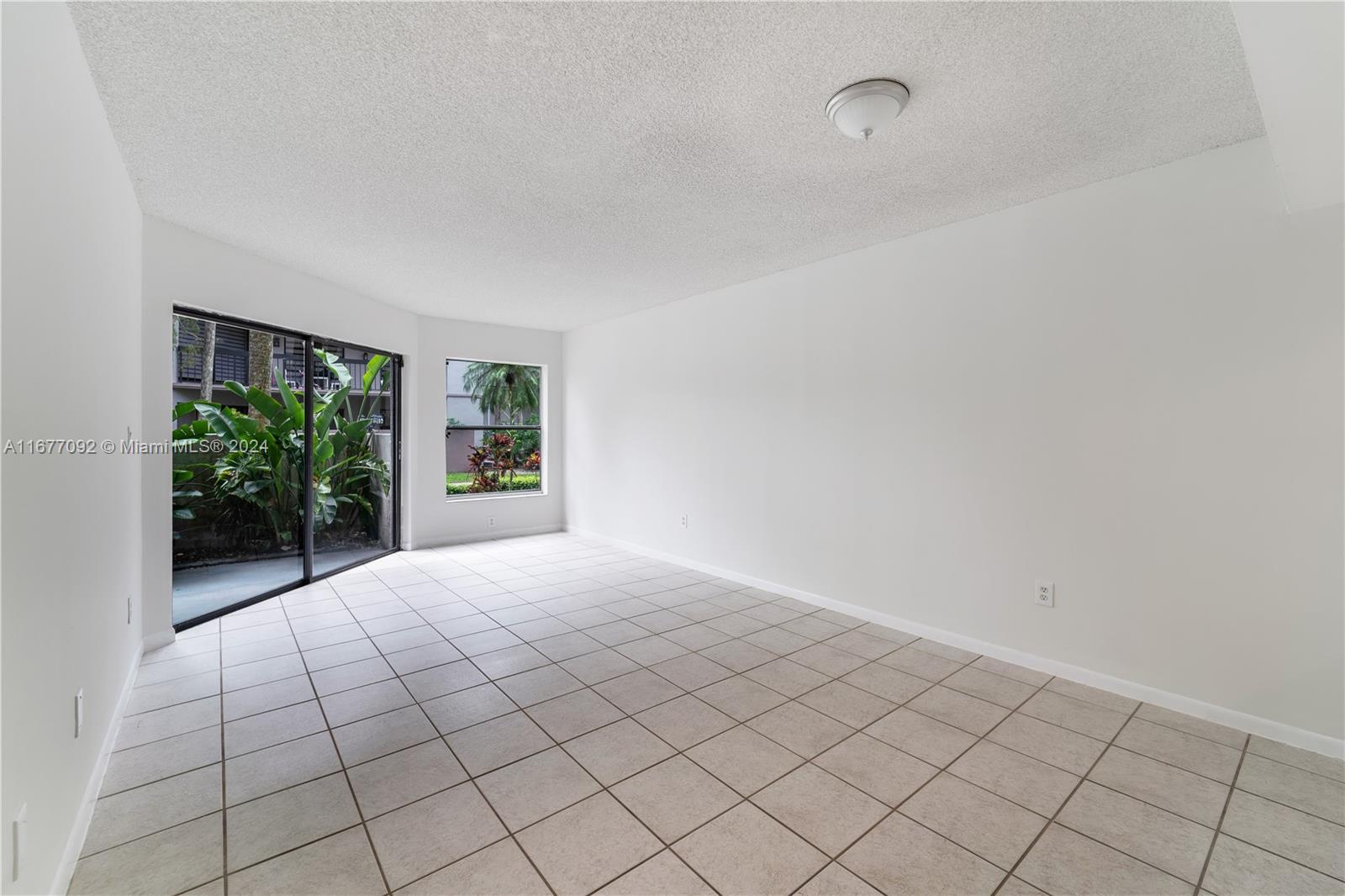 a view of an empty room with window