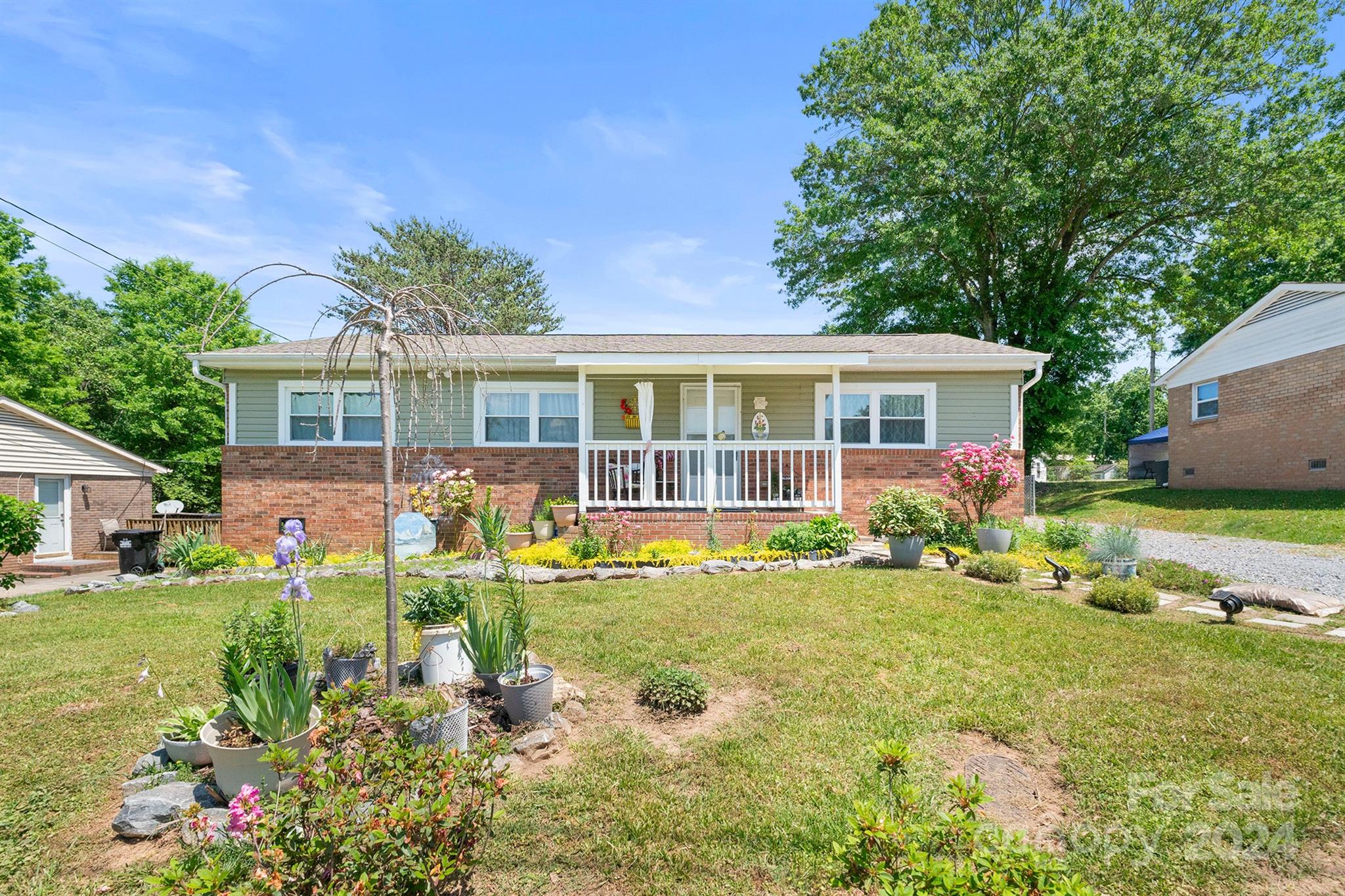 front view of a house with a yard